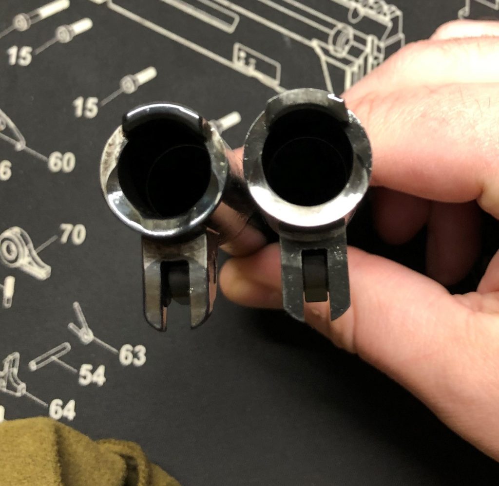 Barrel feed ramp differences. Polished on RIA (right), not on Colt (left)